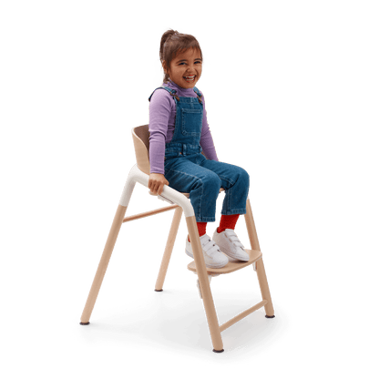 Bugaboo_Giraffe_chair_with_child